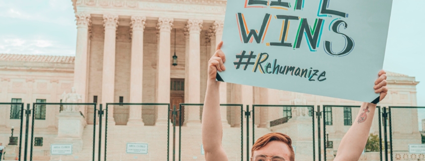 Pro-life advocate Herb Geraghty holds a "Life Wins" sign outside the Supreme Court building