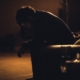 A depressed person in the shadows. Photo credit: Gadiel Lazcano on Unsplash