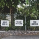 Signs on a fence display mental health messages