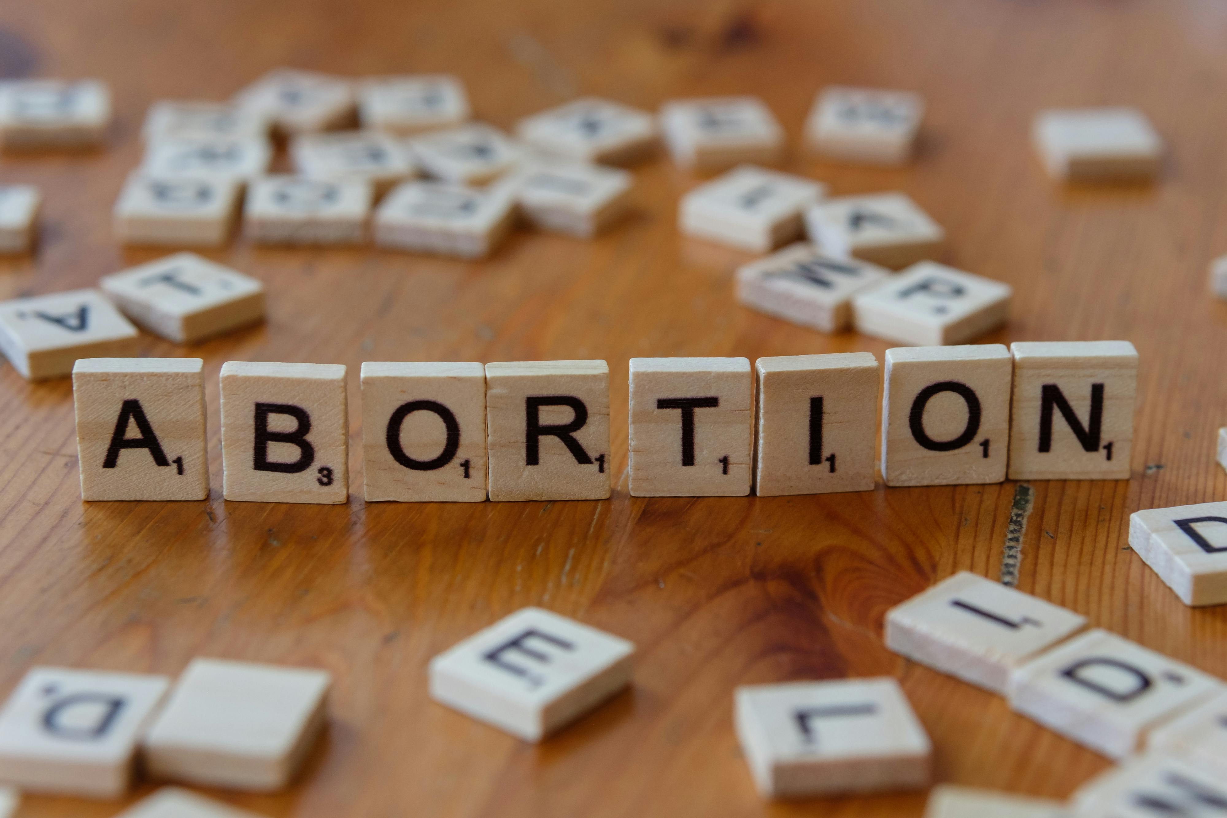 Abortion spelled in Scrabble letters.
