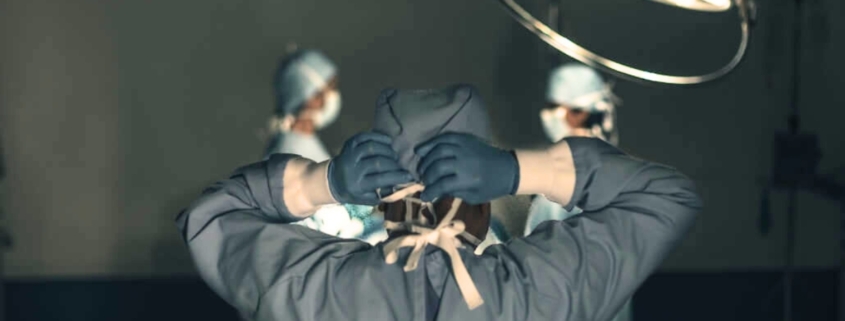 image of a surgeon from behind